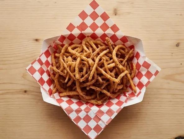 Popular item de Hot Mamma's Kitchen: Paja de Cebolla