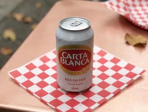Popular item de Hot Mamma's Kitchen: Carta Blanca (lata)